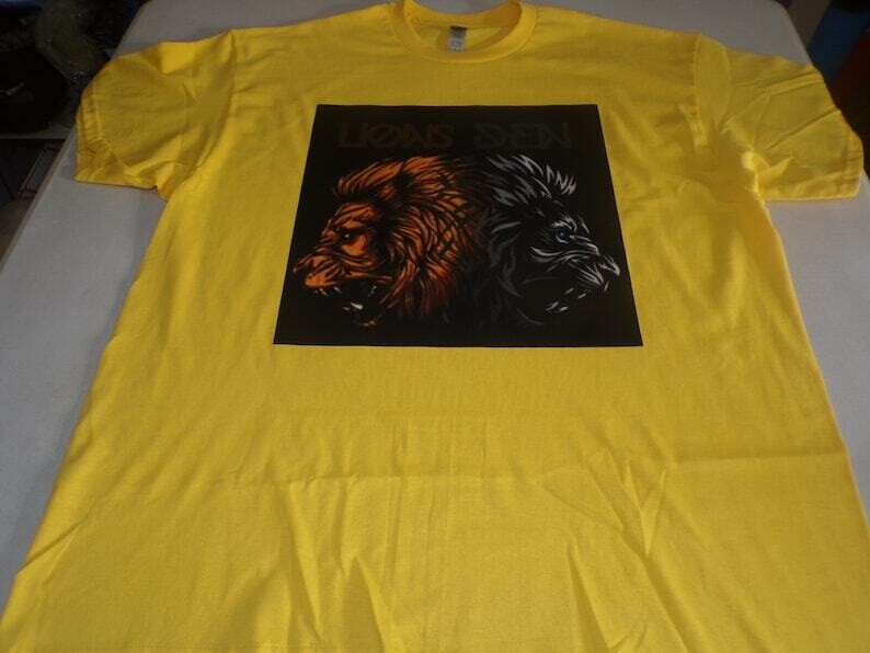 Lions Den 2 Faces Yellow Tee Bronze/Gold Fringes