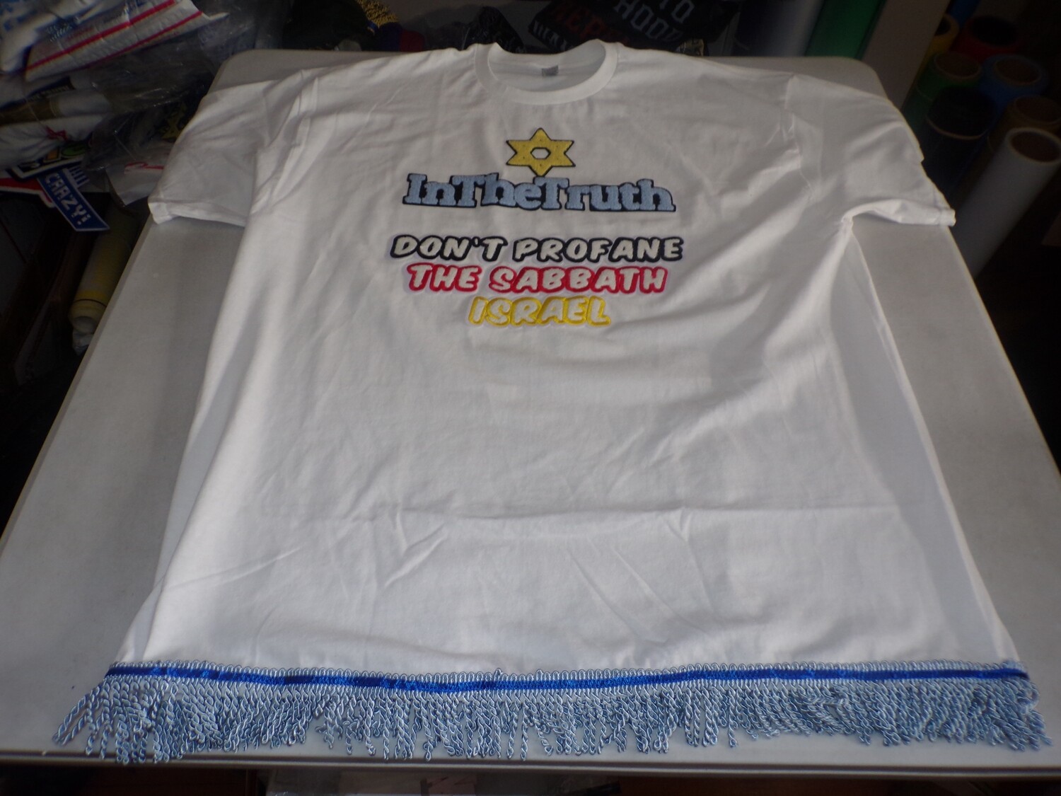 In The Truth Don&#39;t Profane The Sabbath White Shirt w/Sky Blue Fringes
