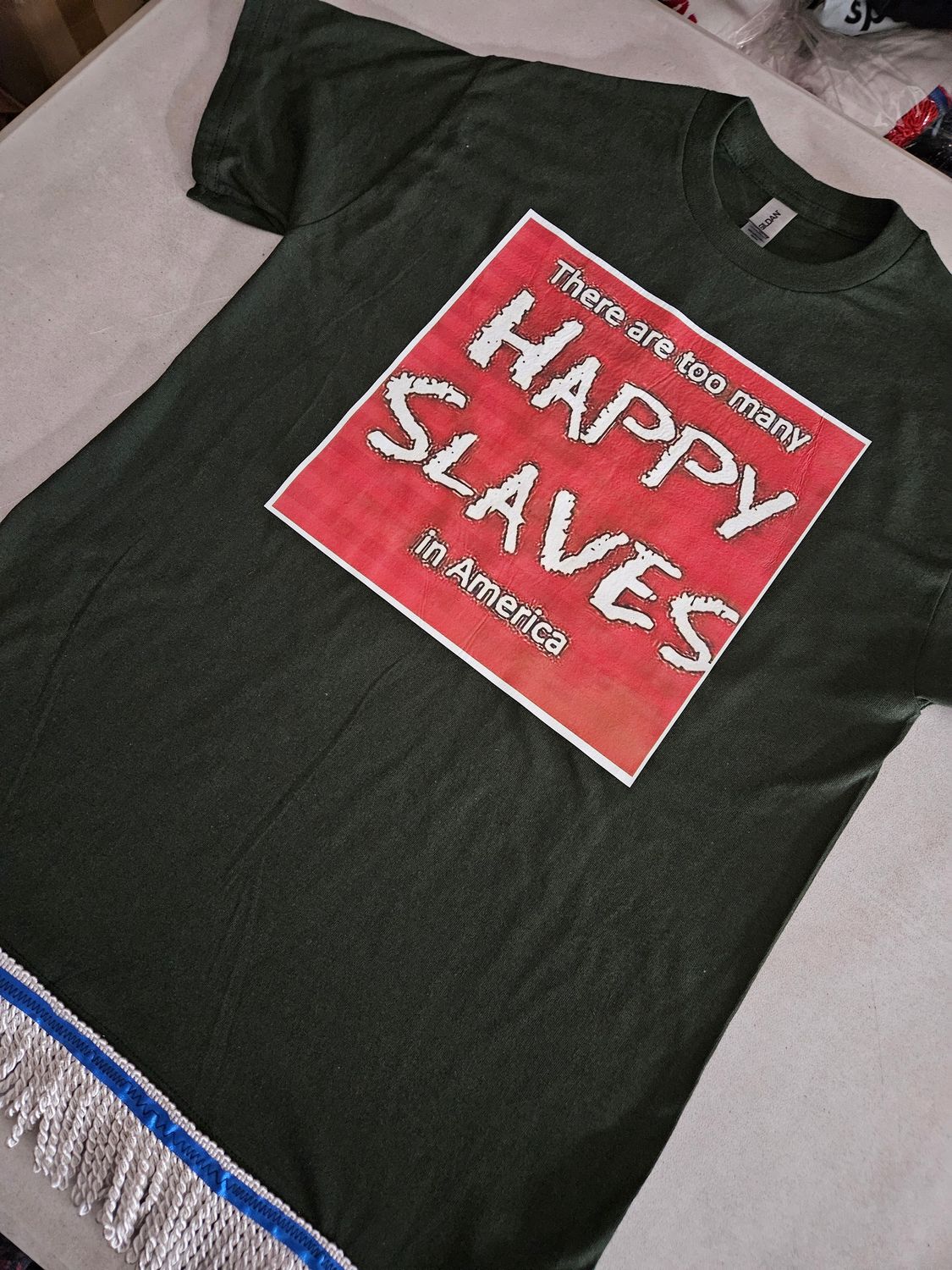 There Are Too Many Happy Slaves in America Forest Green Tee White Fringes