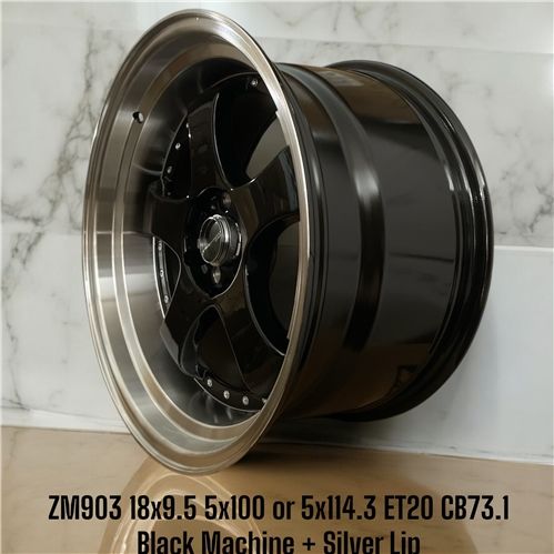 ZM903 - 18X9.5 5X114.3 OR 5X100 ET20 CB73.1 BLACK MACHINE + SILVER SIDE