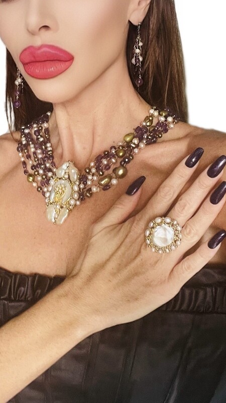 Jewelry set:  necklace, ring and earrings.