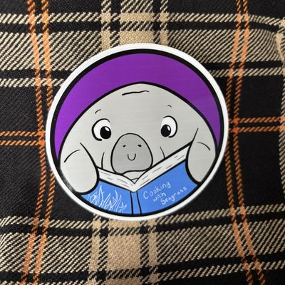 Reading Manatee Sticker