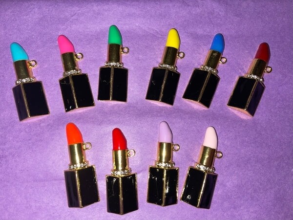 Gold lipstick charms