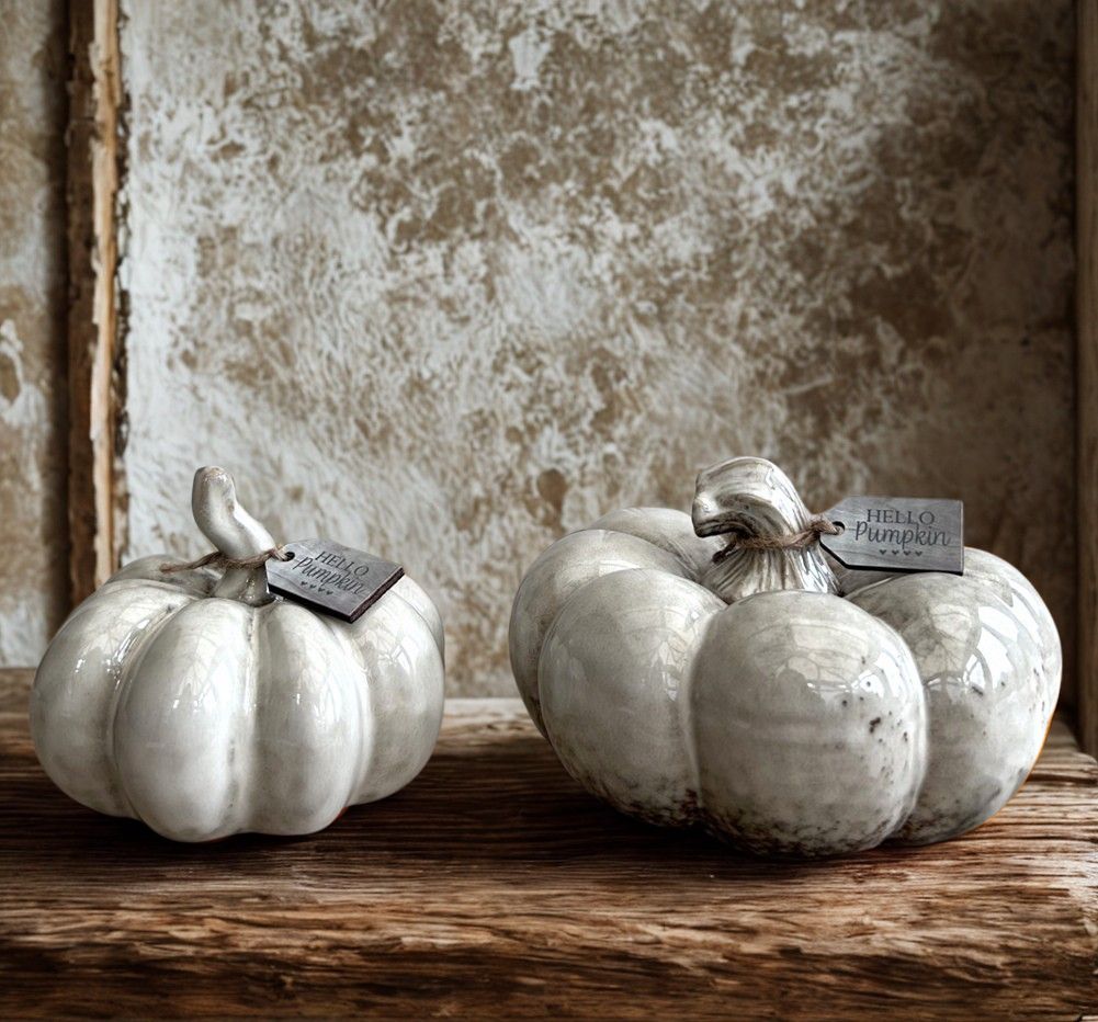 Set of two ceramic pumpkins with a glossy, reactive glaze in shades of grey. Small wooden tag engraved Hello Pumpkin attached