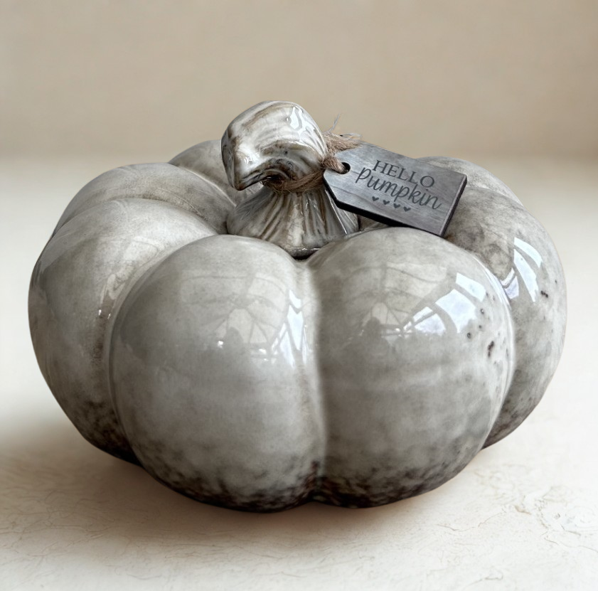 Set of two ceramic pumpkins with a glossy, reactive glaze in shades of grey. Small wooden tag engraved Hello Pumpkin attached
