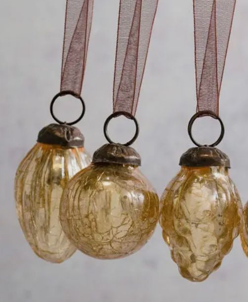 Vintage style champagne crackle glaze glass baubles with an ornate brass cap and coordinating organza tie. Set of six