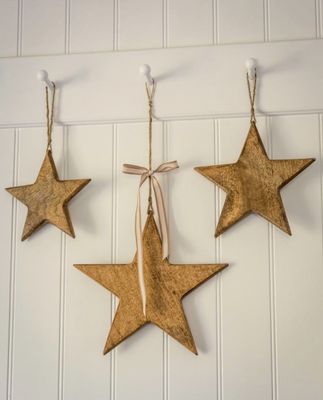 Vintage Wooden Stars - Set of 3 Set of three hanging wooden stars for a rustic accent to hallways, kitchens and more. Not just a seasonal decoration