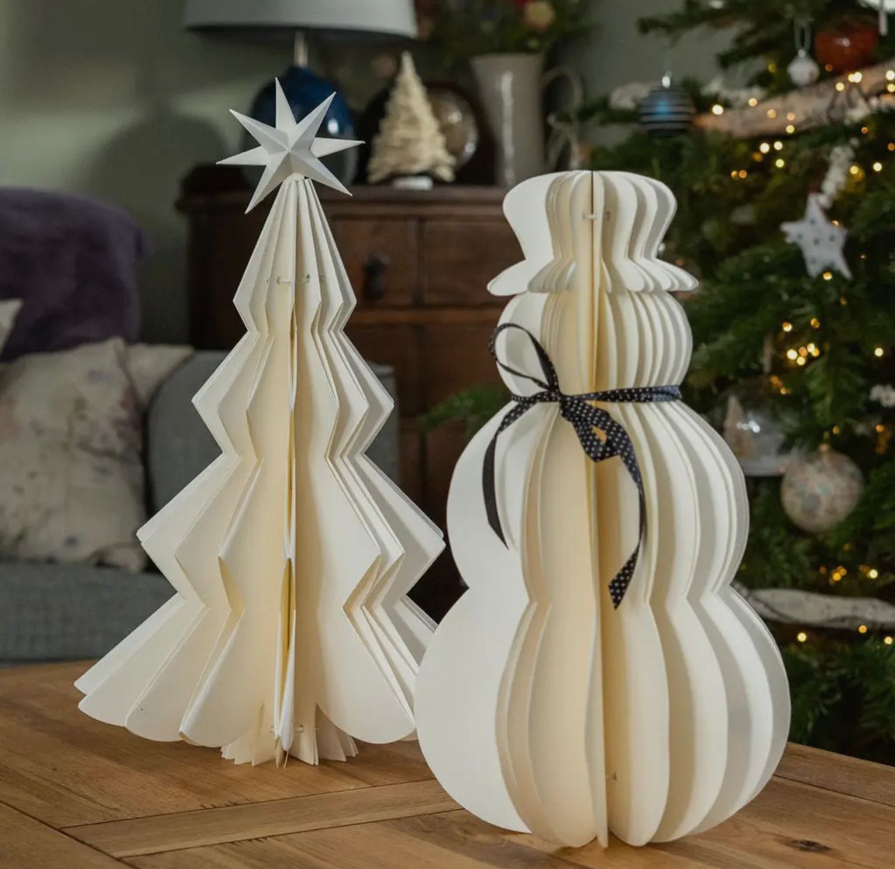 These stunning paper Snowman are laser cut from heavy duty white paper and lovingly assembled by hand.