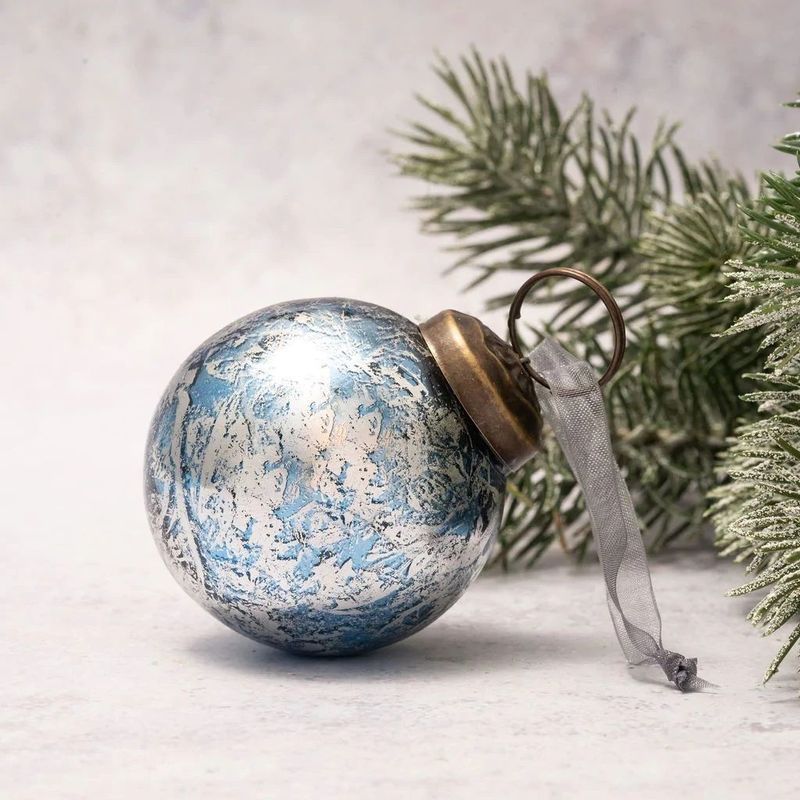 Beautiful icy blue and silver foil baubles with antiqued tops and silver organza ties