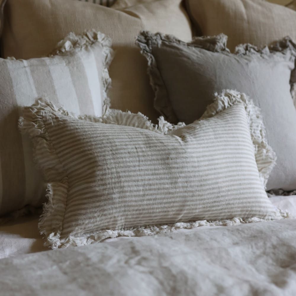 Hallie Natural Stripe Linen Rectangle Cushion with pretty ruffled edging detail blends perfectly with our bedding range
