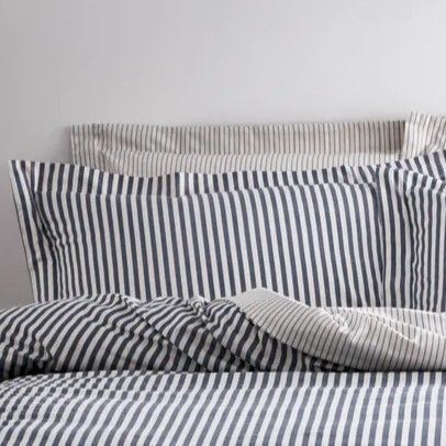 Hebden Oxford Pillowcase Set - Navy Add an extra cosy layer on your bed with these navy and white striped pillowcases.