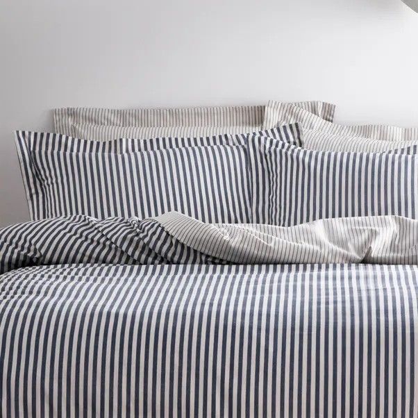 Fresh crisp navy and white striped cotton bedding for a coastal theme bedroom. Vintage style with modern comfort 