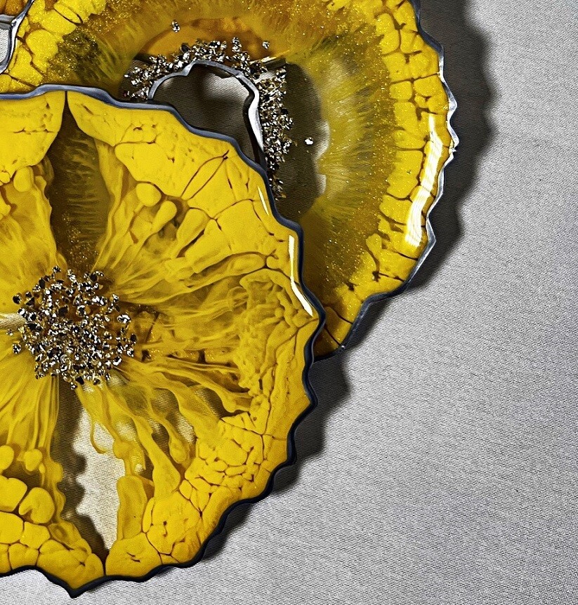Yellow and silver Resin Coasters