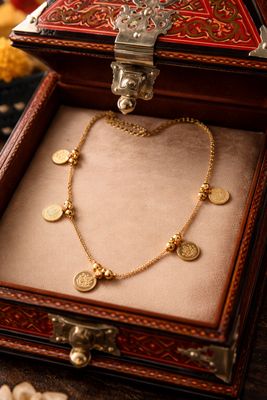 Gold tone coin neck chain