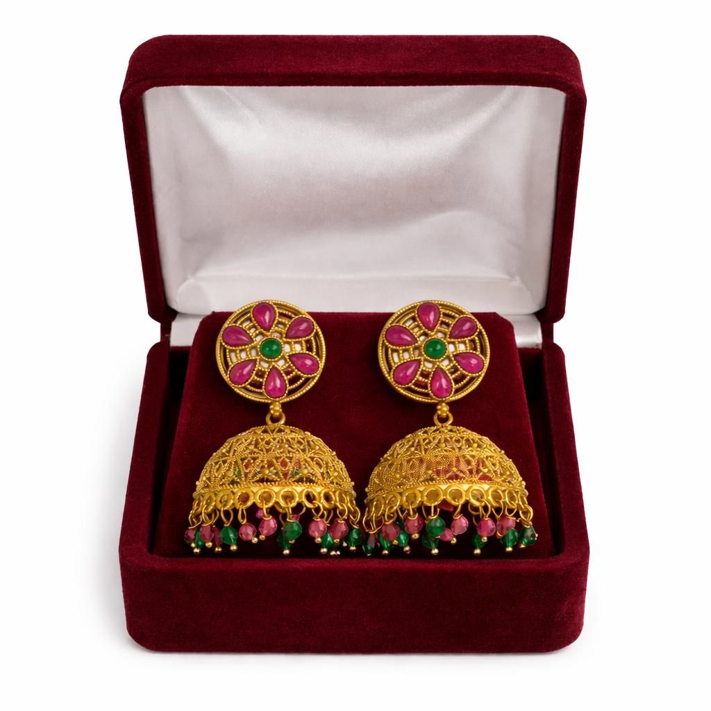 Gold-tone filigree dome jhumka earrings with pink and green stones