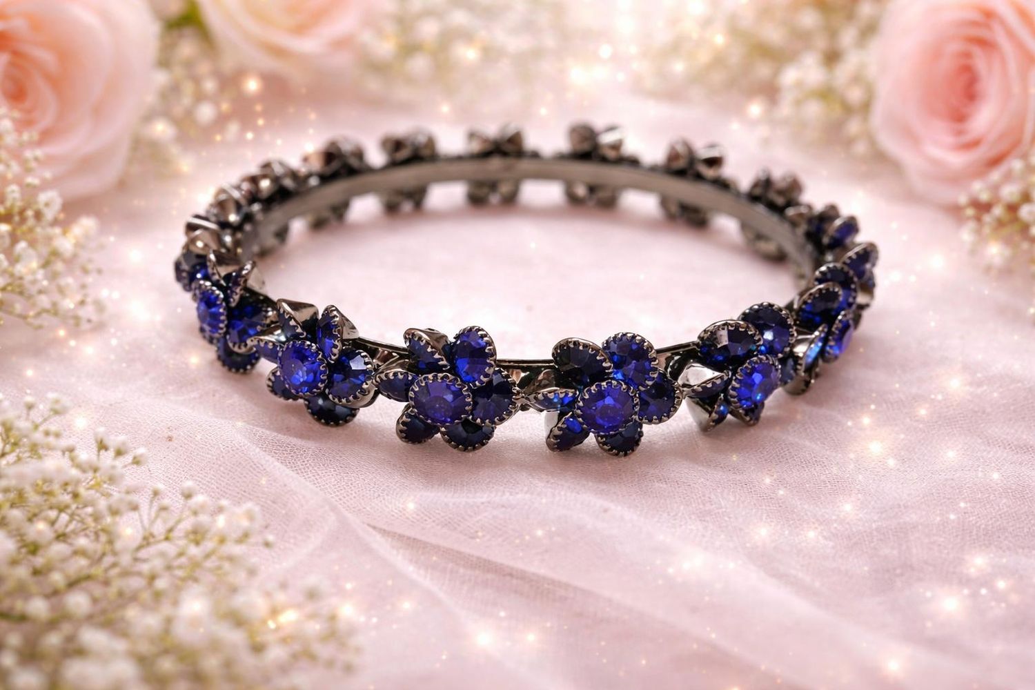 Dark metal bangles with deep blue stones