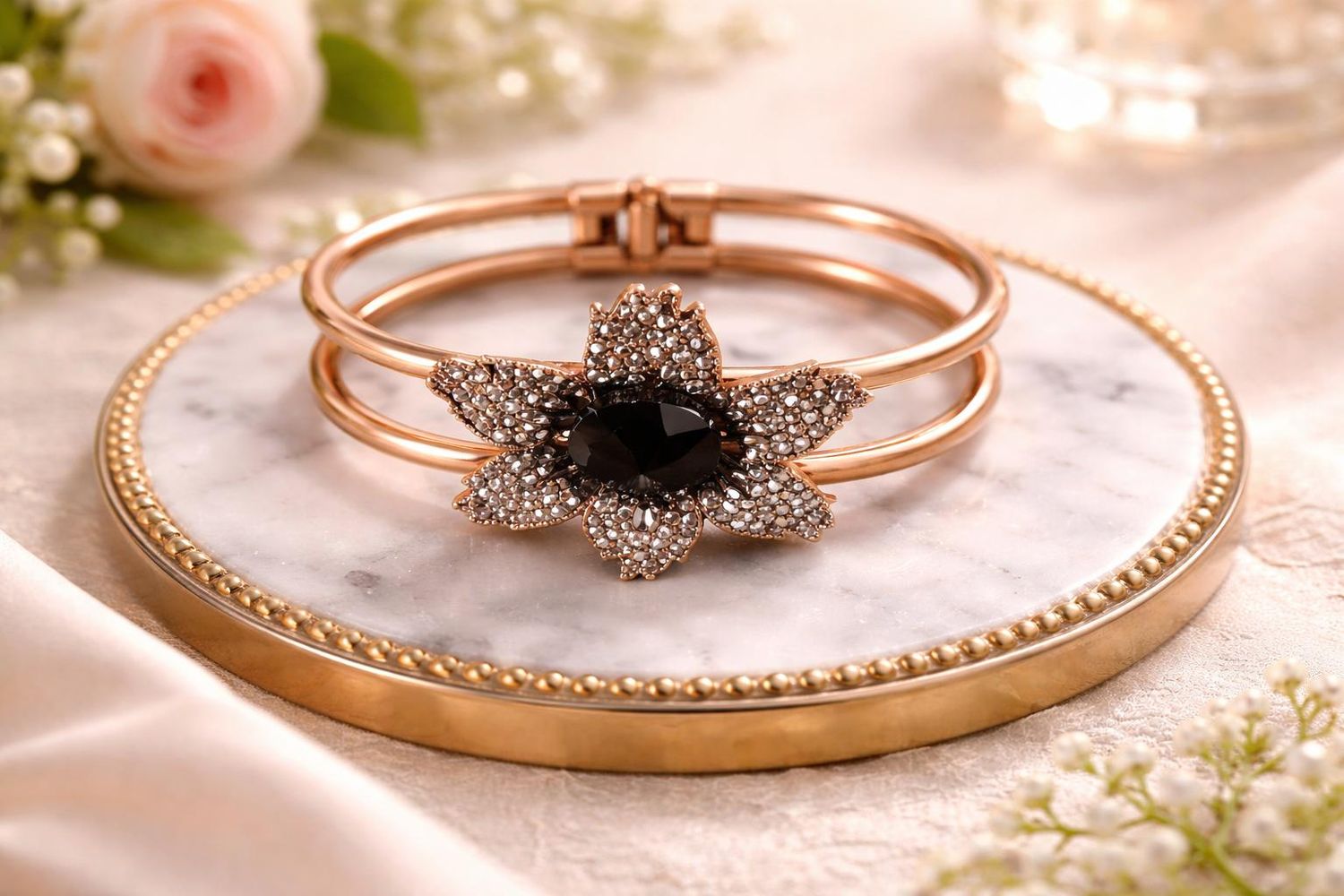 Small rose-gold tone white with black flower Bangle