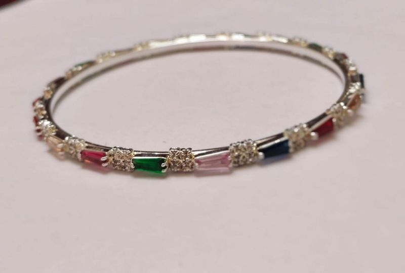 Silver-tone bangle with multicolour rectangular stones