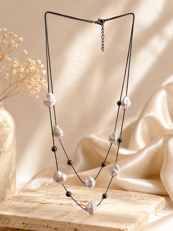 White and black  beaded neckchain with black tone bead chain