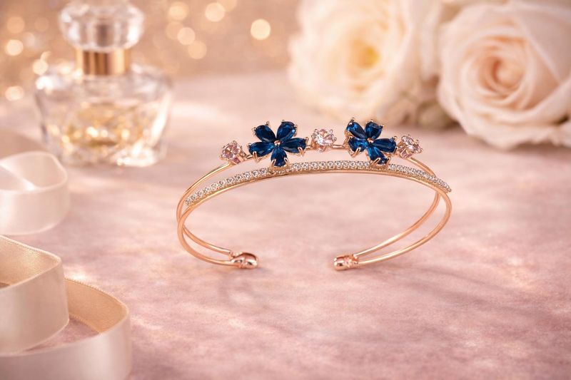 Rose-gold tone blue with white stone bangle