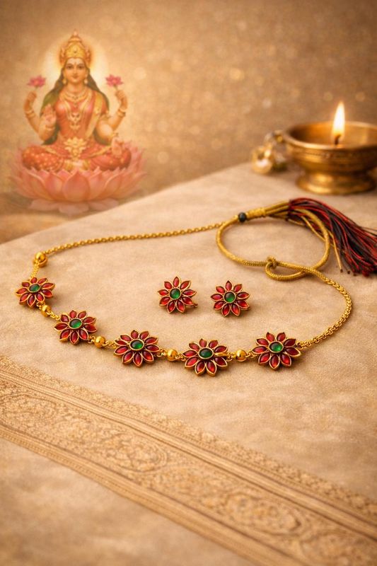 Gold-tone necklace set with pink and green flower charms and matching earrings