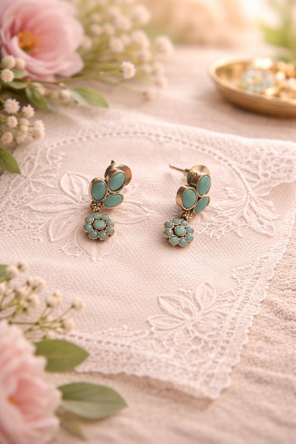 A pair of elegant turquoise-colored stud earrings