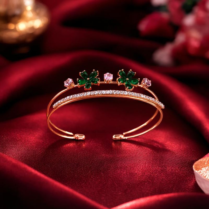 Rose-gold tone green with white stone bangle