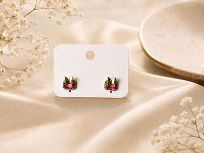 Pink with green stone butterfly stud
