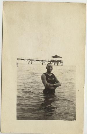 1920s - Man in the Ocean with a Pier in the background, Galveston?