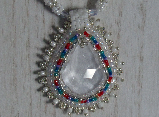 Crystal Teardrop wonderful white design with rainbow accents