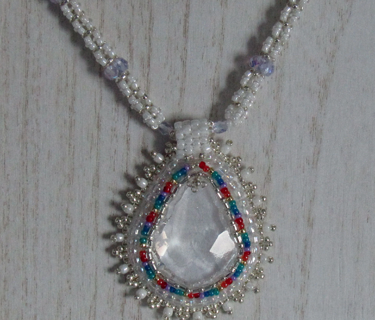 Crystal Teardrop wonderful white design with rainbow accents