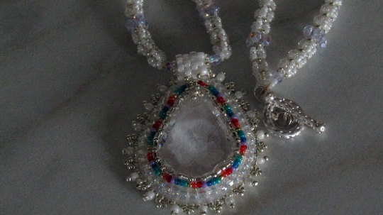 Crystal Teardrop wonderful white design with rainbow accents