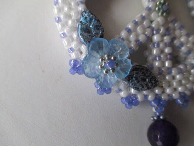 White Beaded Peace Sign with Blue and purple Accents
