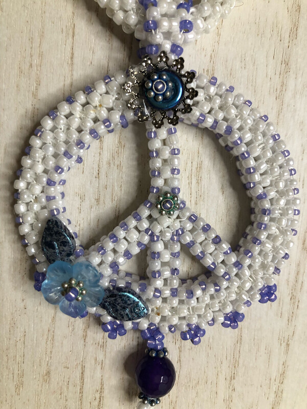 White Beaded Peace Sign with Blue and purple Accents