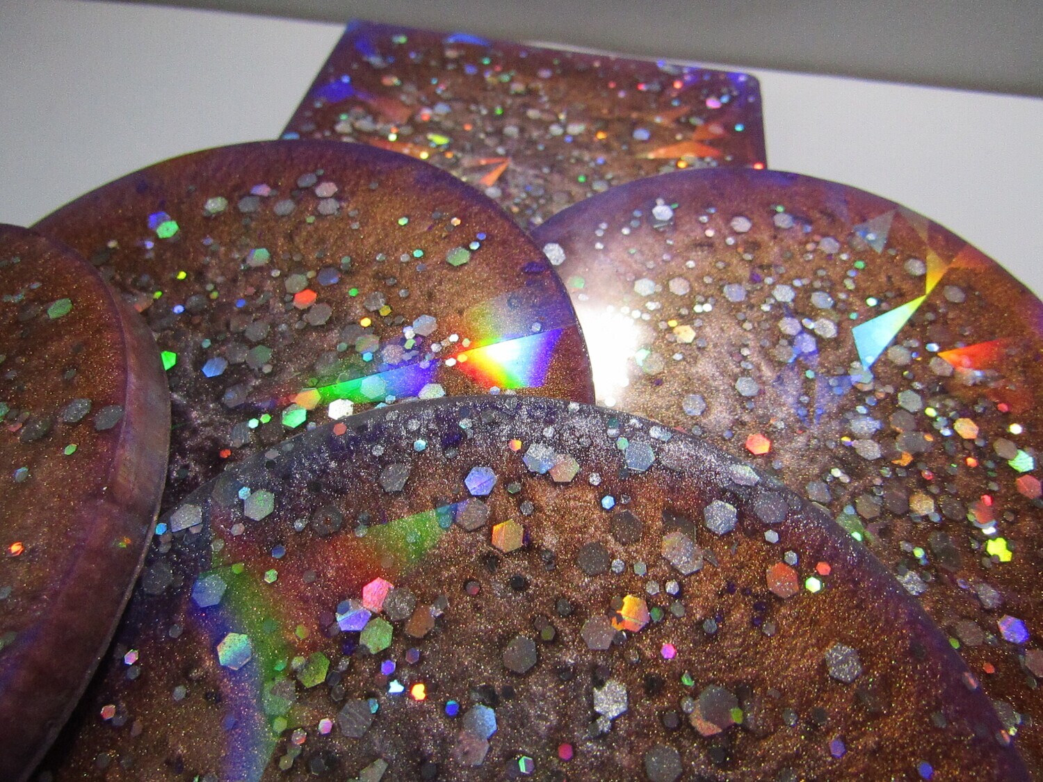 Holographic purple and gold coaster set