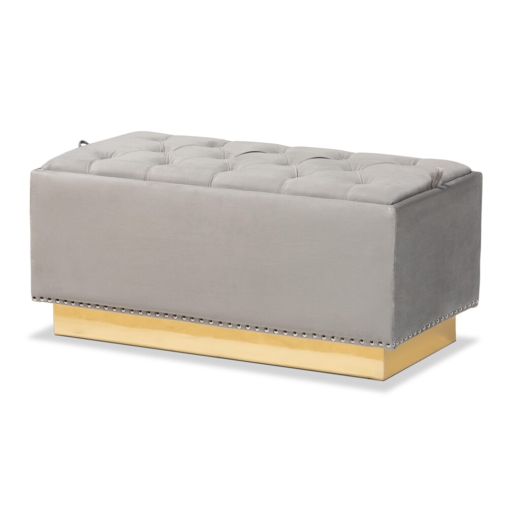 BAXTON STUDIO POWELL GLAM AND LUXE GREY VELVET FABRIC UPHOLSTERED AND GOLD PU LEATHER STORAGE OTTOMAN