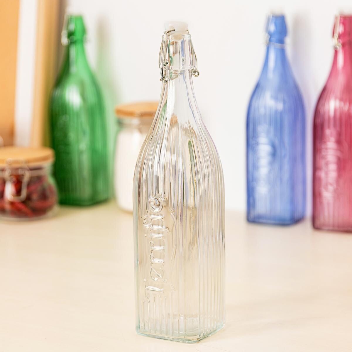 BOTELLA DE AGUA TRANSPARENTE CON TAPÓN