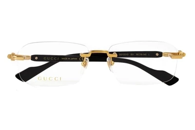 Gucci GG1221O 001 gold - black occhiali