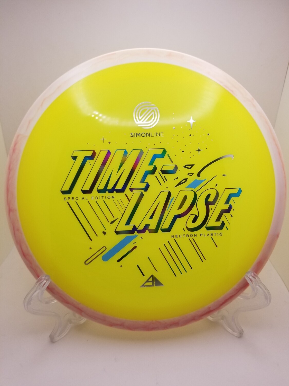 Axiom Discs Special Edition Time Lapse Dayglow Yellow and Swirly Pink Rim Neutron 172g. Simon Line