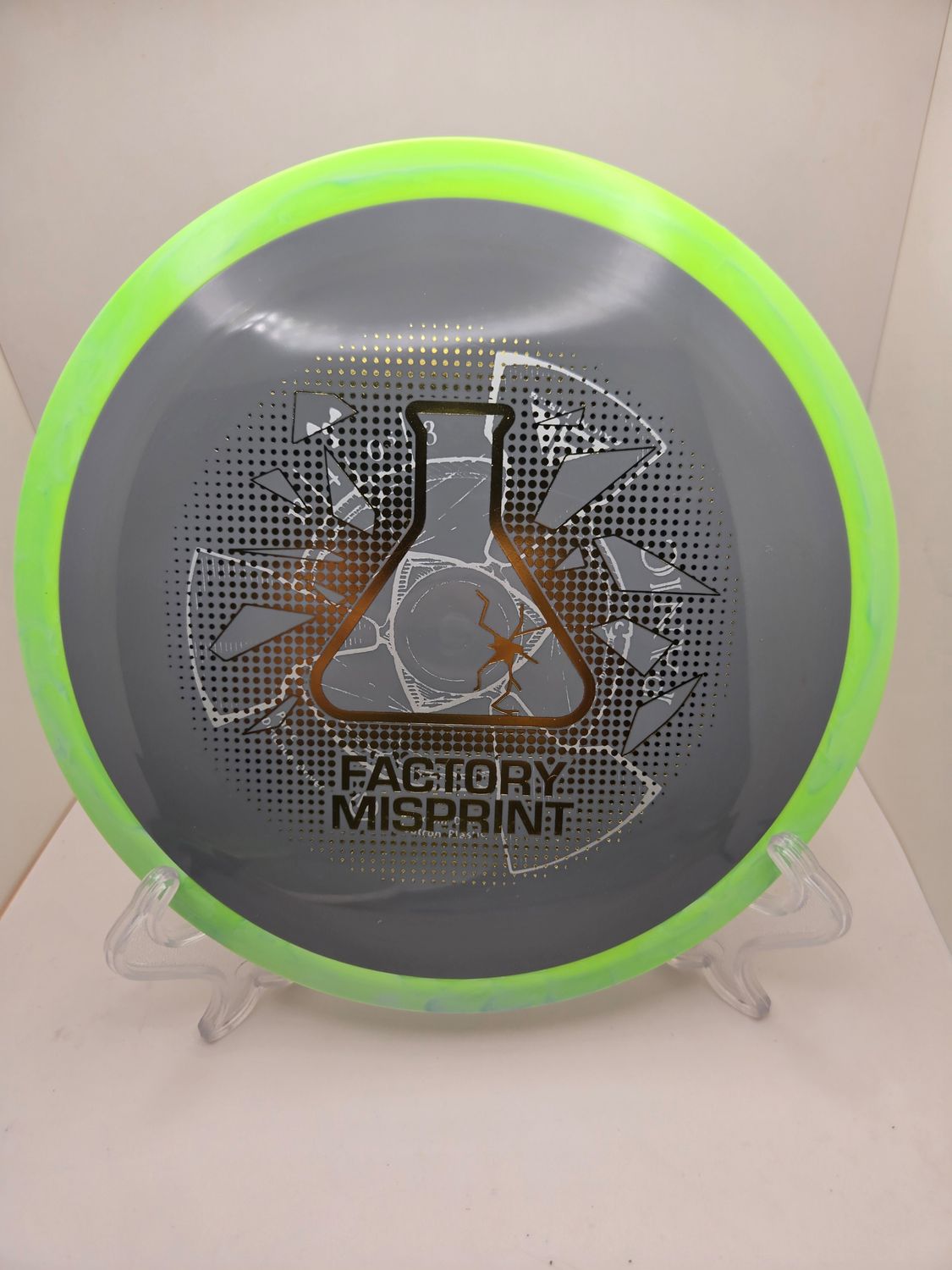 Axiom Discs Misprint Panic Grey with Green Swirly Rim 173g