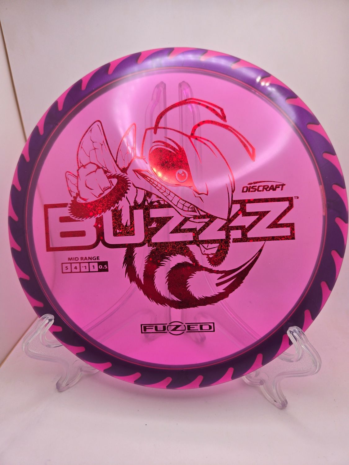 Discraft Discs Fuzed Z Buzzz with BuzzzSaw Pattern Purple with Blue Back Red Sparkle Stamp 177+g
