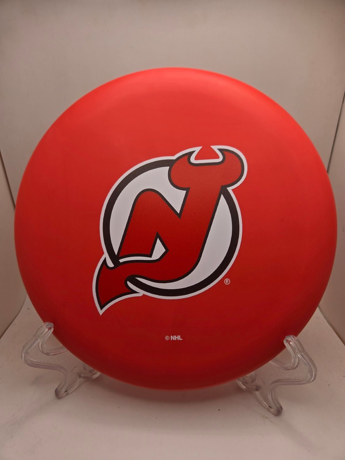 Prodigy Discs Pivot BaseGrip Plastic - NHL Primary Logo Stamp NJ Devils Red 172g