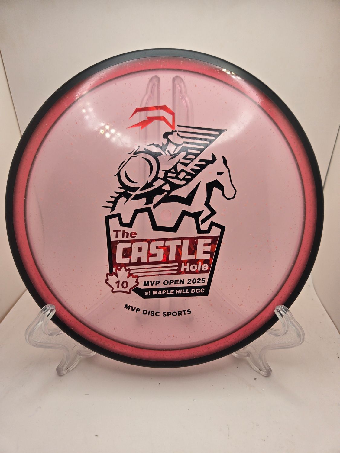 MVP Discs 2025 MVP Open &quot;The Castle Hole&quot; Particle Glow Reactor Pink 177g