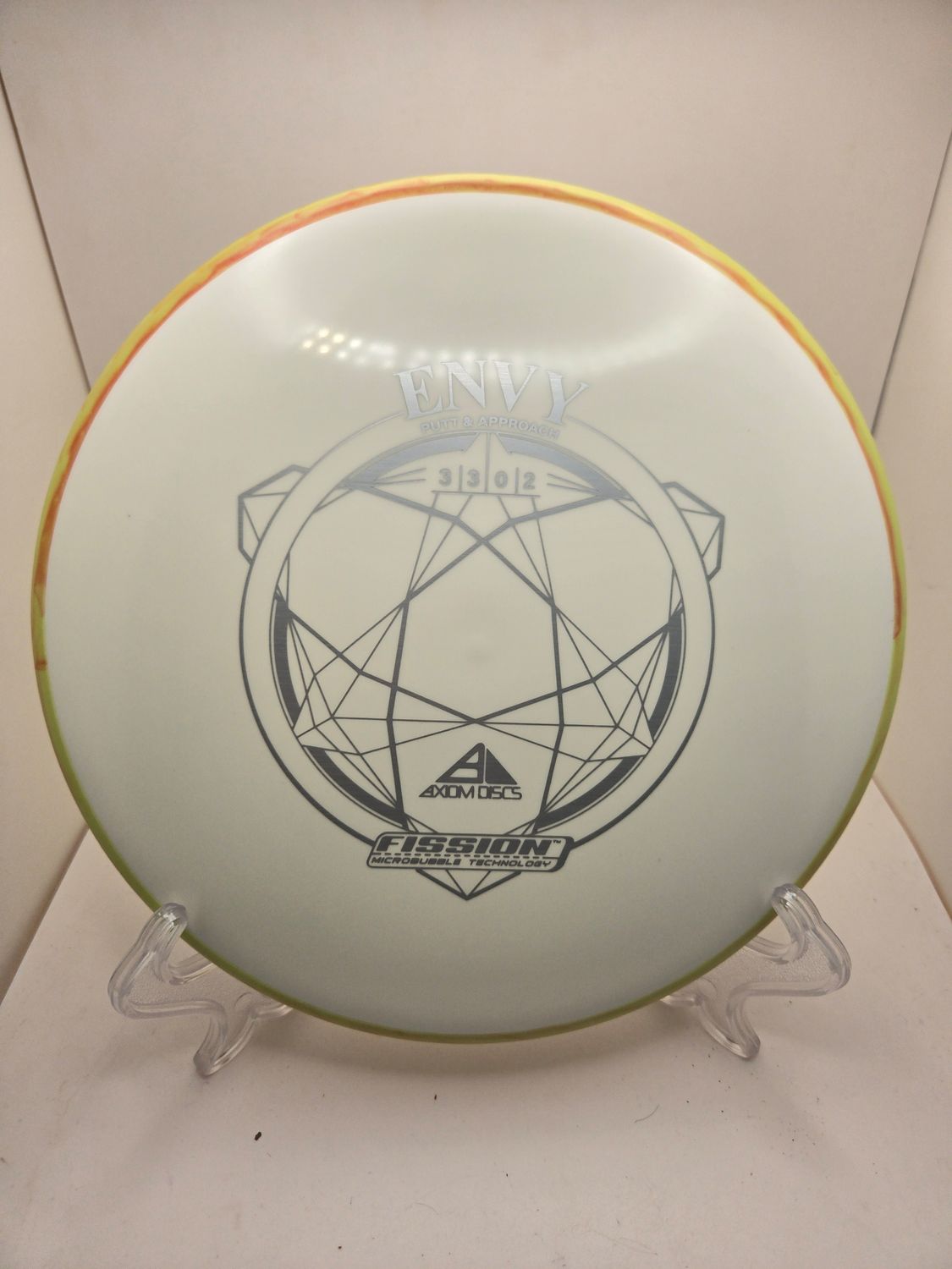 Axiom Discs Stamped Envy Fission White Plate with Swirly Orange Rim 173g