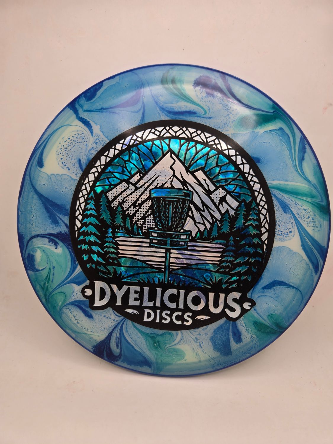 Innova Discs Triple Foil 1 of 1 Dyelicious Discs Stamped Glow Firebird with Blue Flower background and White Stamp Dyed 173-175g
