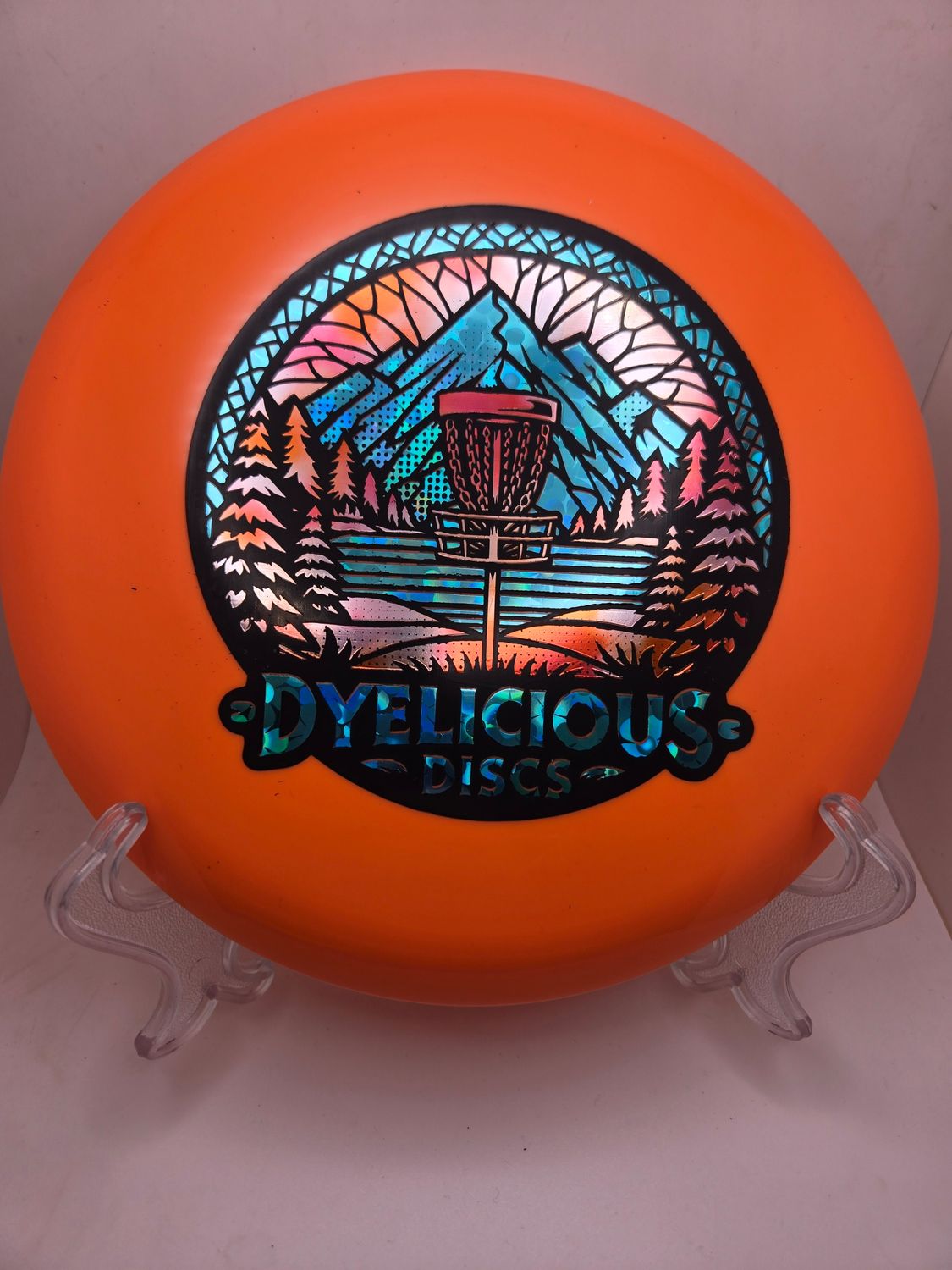 Innova Discs Triple Foil 1 0f 1 Dyelicious Discs Stamped Star Rollo Orange with Gradient Red Background and Blue Flower 180g