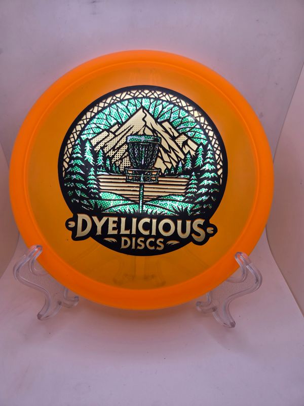 Innova Discs Triple Foil 1 0f 1 Dyelicious Discs Stamped Champion Rollo Orange with Leopard Green Background and Gold 180g