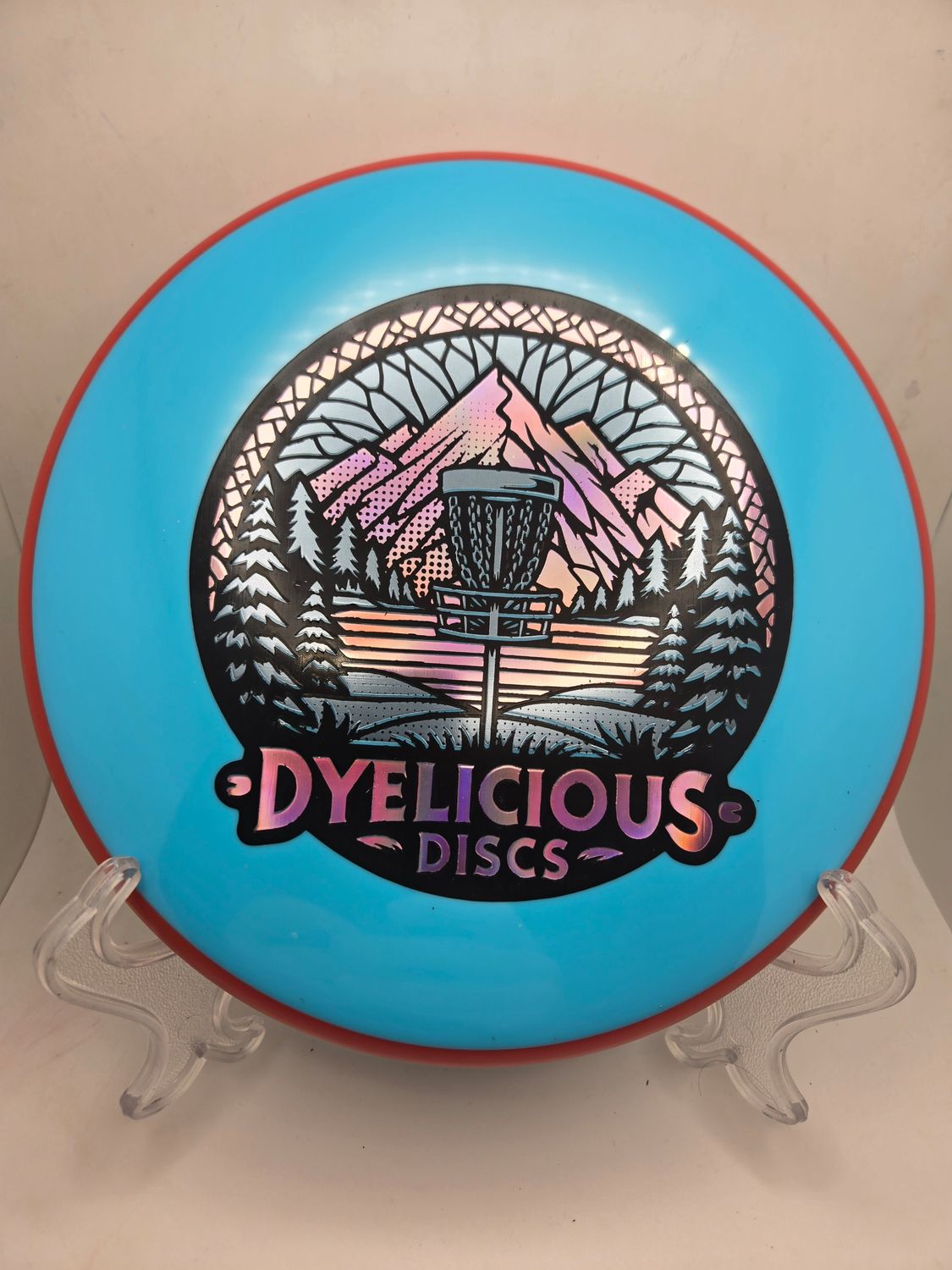 Axiom Discs Proxy Neutron Soft Triple Foil 1 0f 1 Dyelicious Discs Stamped Teal Blue with Red Rim with Teal background and with Pink Stamp 172g