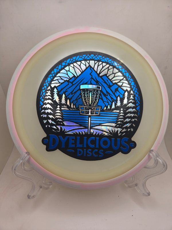 Axiom Discs Virus - Eclipse Green with Pink/White Swirly Rim Triple Foil 1 of 1 Dyelicious Discs Stamp with Blue background and Money stamp 171g