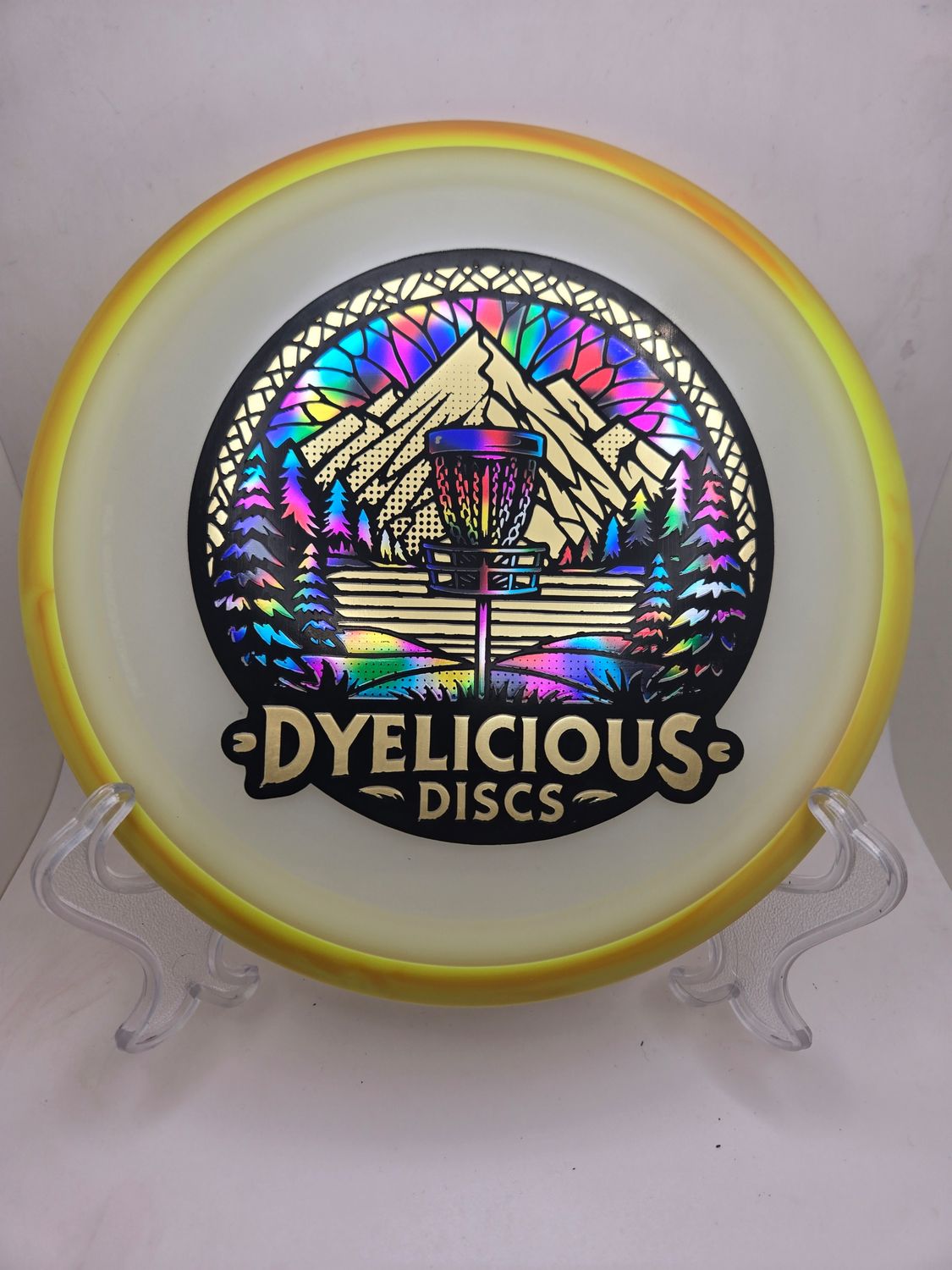 Axiom Discs Virus - Eclipse Green with Yellow/Orange Swirly Rim Triple Foil 1 of 1 Dyelicious Discs Stamp with Gradient Fade background and Gold stamp 173g